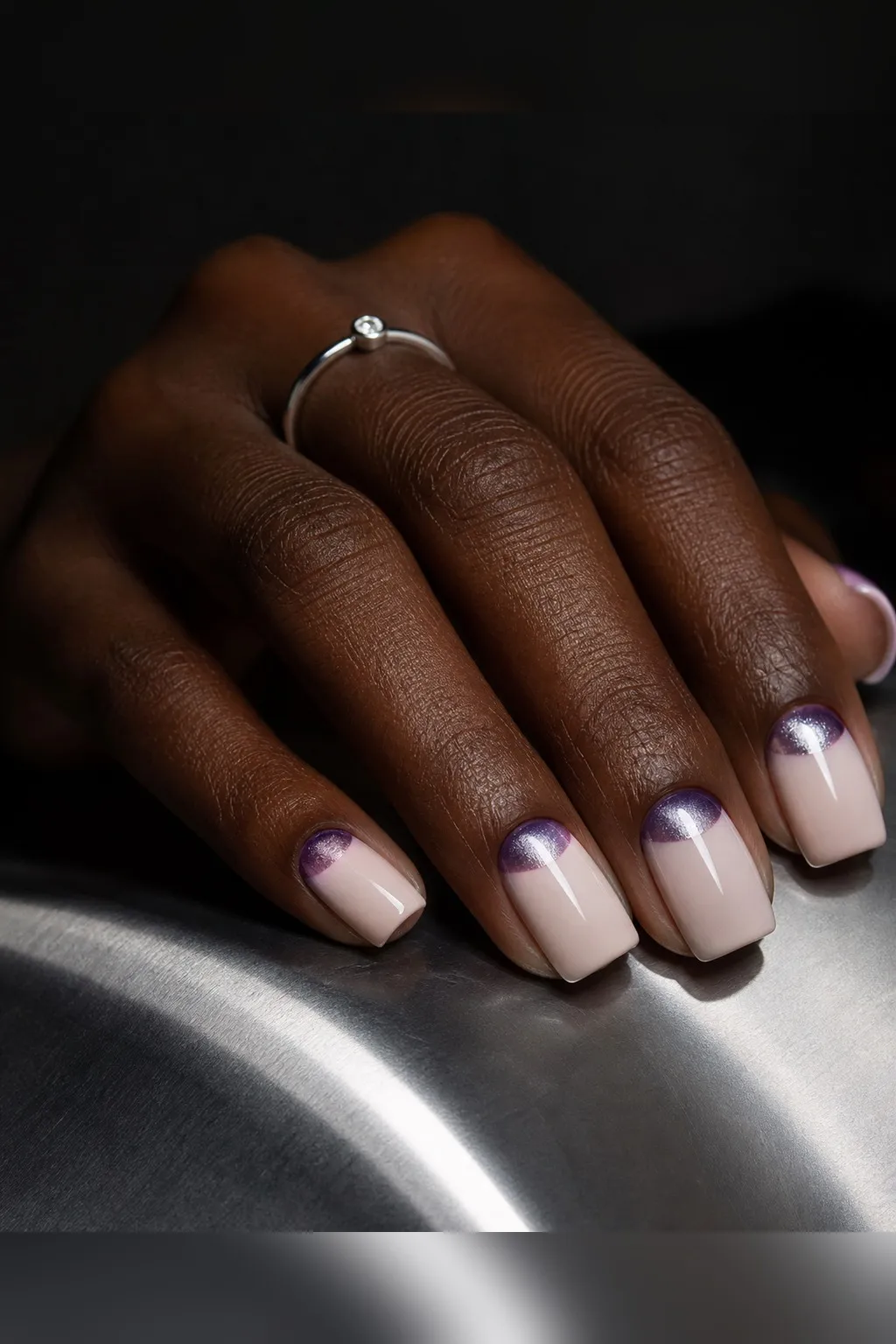 Cat-Eye Half-Moon — square cat eye nails with sheer nude base with a violet magnetic cat-eye half-moon at the cuticle and a silver flash…