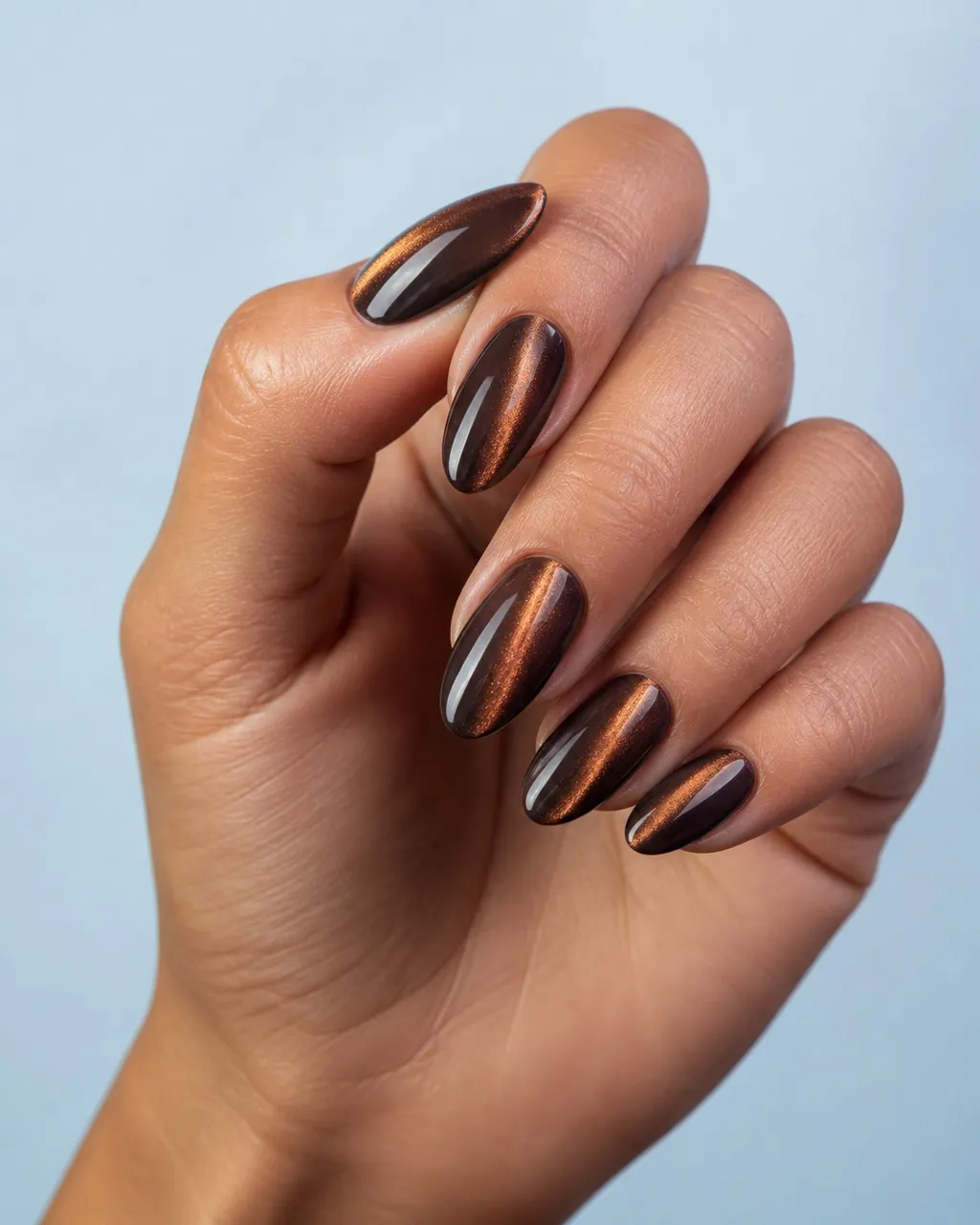 Chocolate Copper Cat-Eye — almond cat eye nails with deep espresso-brown magnetic cat-eye with a copper flash, soft vertical line, glossy…