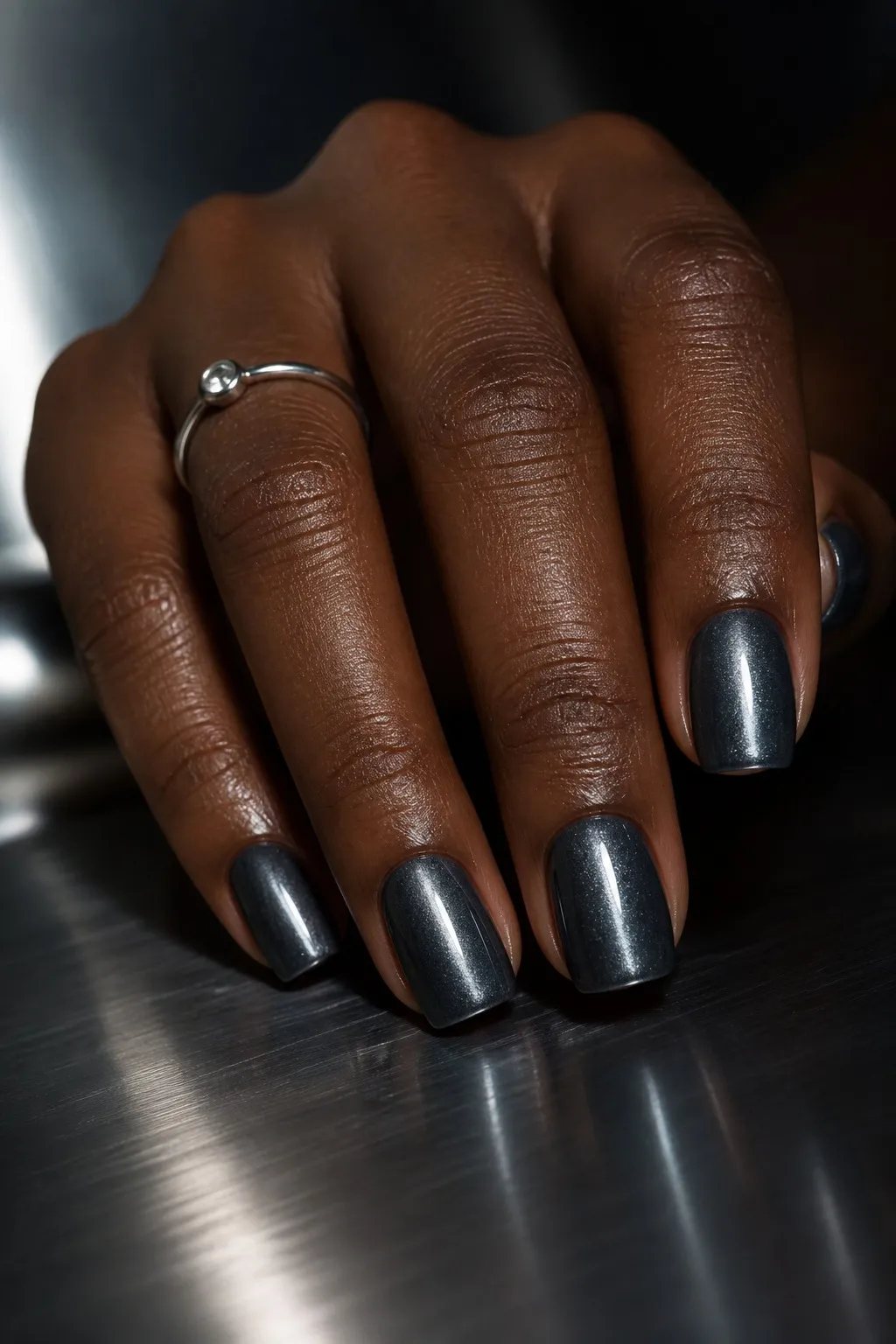 Steel Grey Cat-Eye — square cat eye nails with gunmetal grey magnetic cat-eye with a cool silver flash, vertical line, glossy, short square
