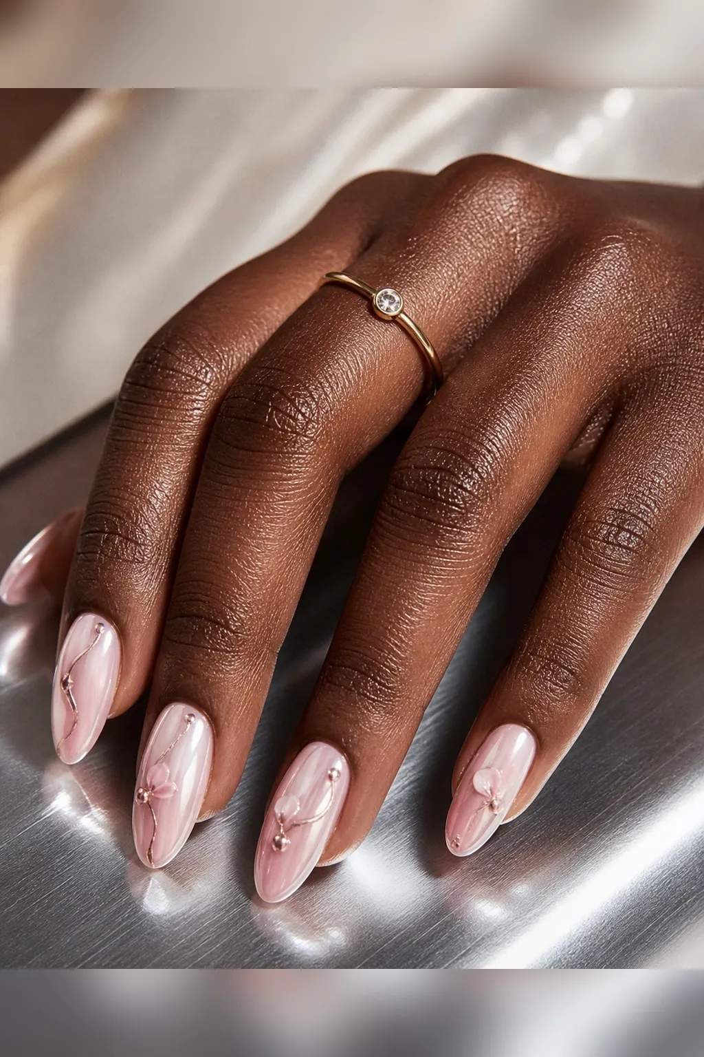 Blush Chrome Sheer — almond chrome nails with sheer ballet-pink base with a soft pink pearl chrome buffed over, glowing rather than mirrored…