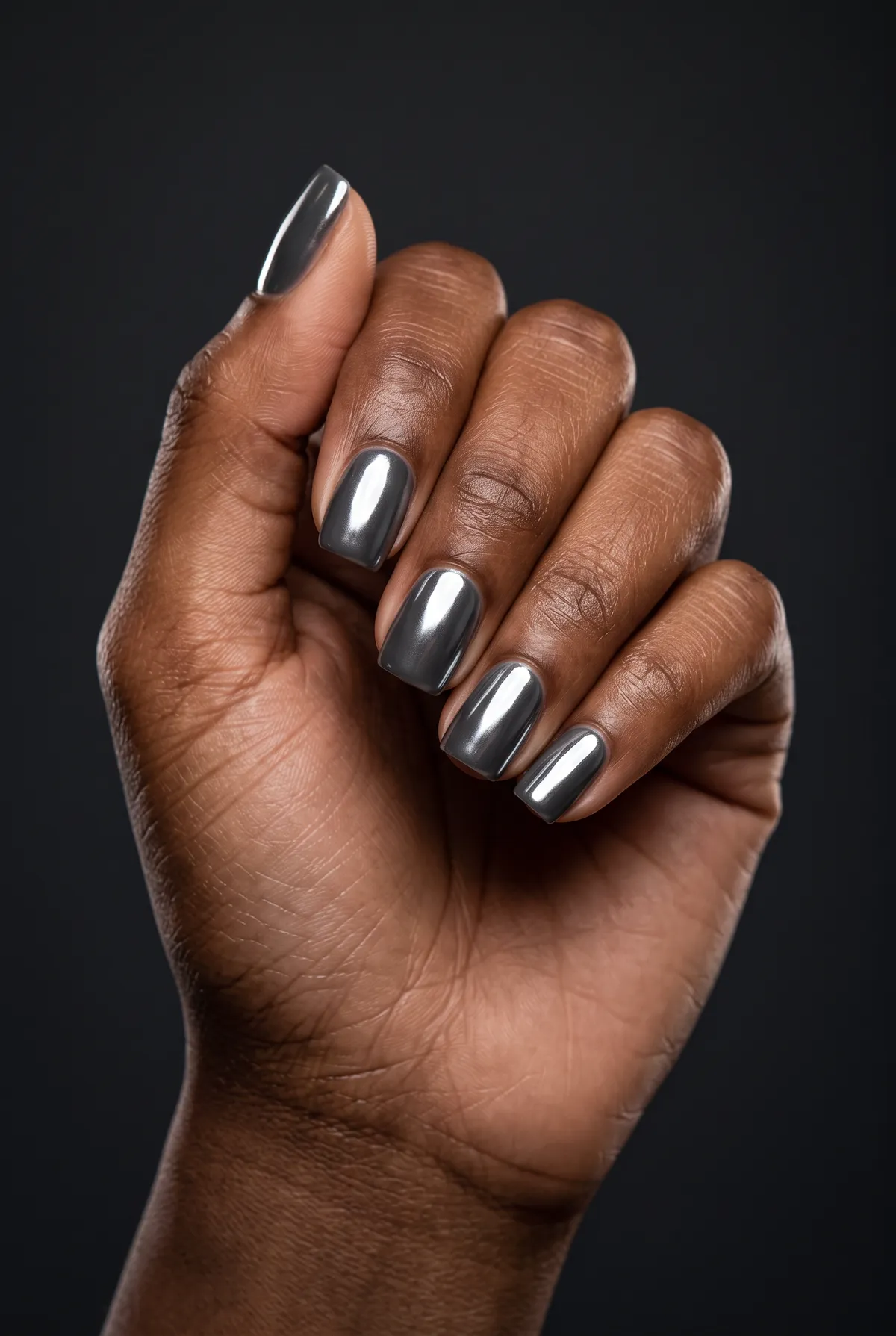 Graphite Edge — square chrome nails with dark grey gel base with graphite chrome powder, glossy seal, short square shape