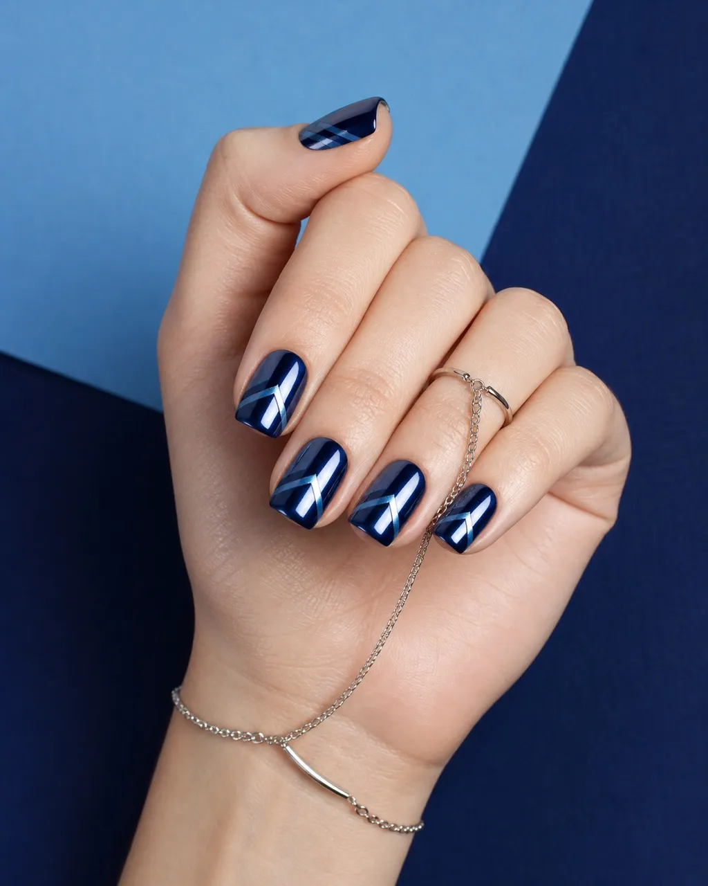 Navy Chrome Square — square chrome nails with deep navy gel base with mirror chrome powder buffed over for a lacquered shine, glossy, short…