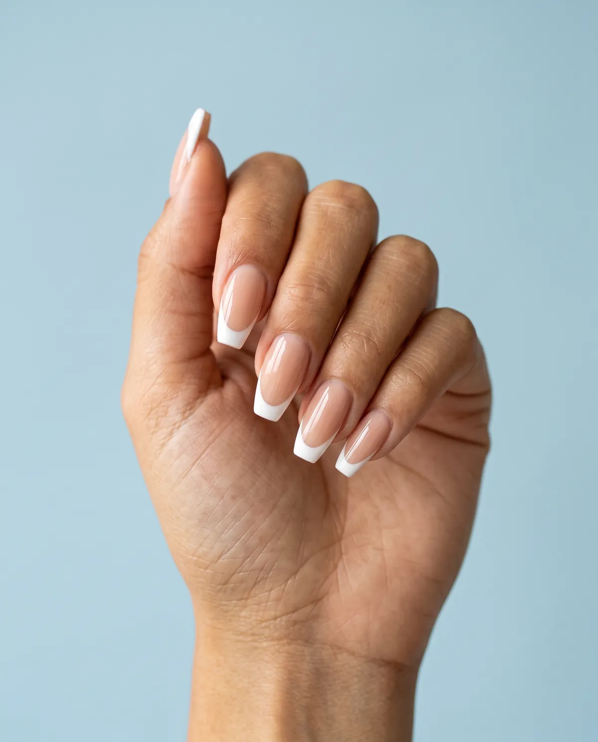 Clean White Tip — coffin coffin nails with classic white french tip over a sheer nude base on a medium coffin shape, please
