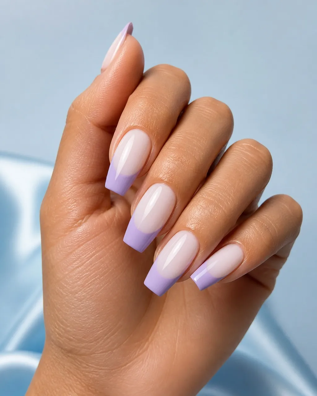 Lavender French Coffin — coffin nails with sheer milky base with a soft lavender french tip along a straight smile line, glossy, medium coffin