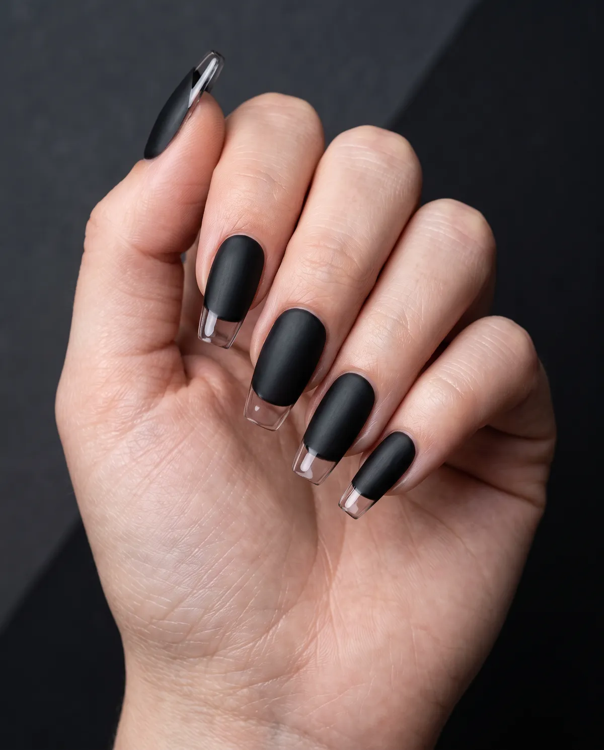 Onyx Glass Tip — coffin coffin nails with matte black gel base with a glossy clear tip on a medium coffin shape, please