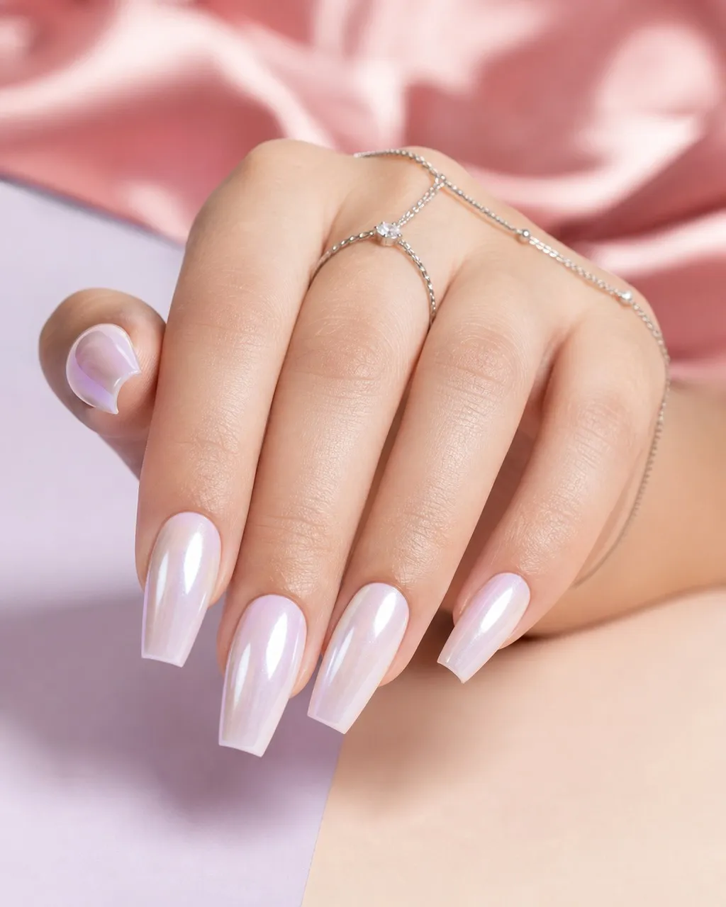 Pearl Chrome Coffin — coffin nails with sheer milky nude base with pearl chrome powder buffed over the whole nail, glass-like top coat…