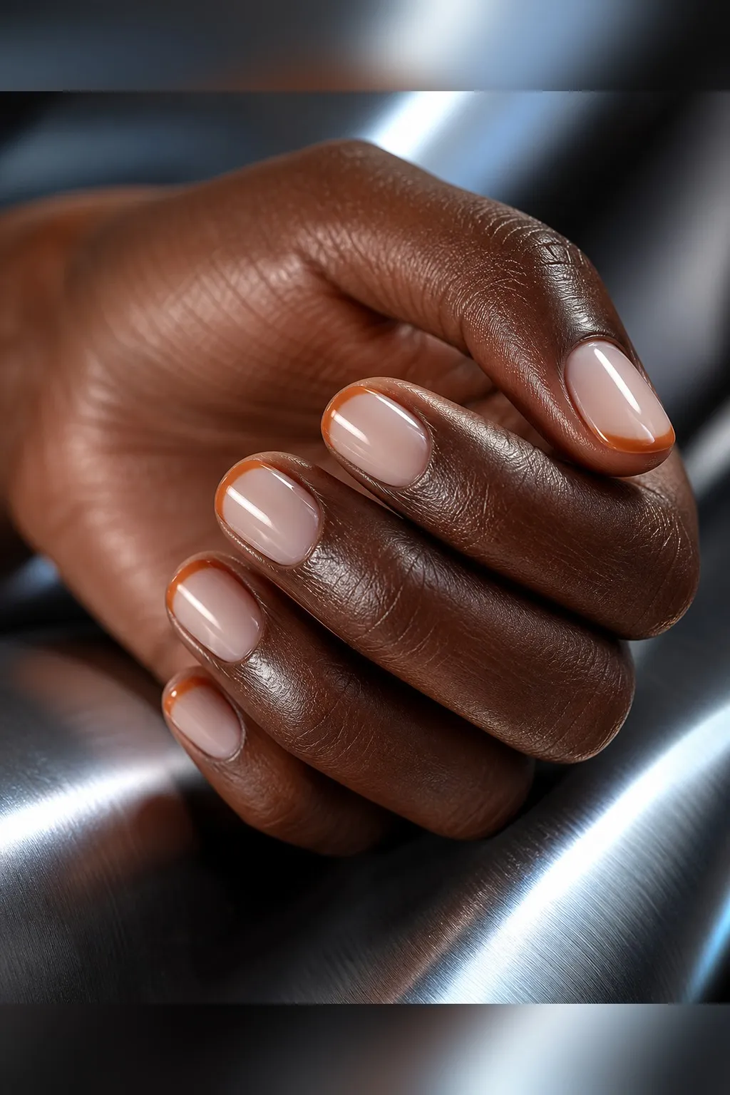 Ginger Root French — round fall nails with sheer base, thin ginger-orange french tip, glossy finish, round short shape