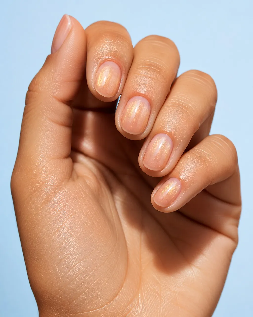 Golden Hour Sheer — round fall nails with sheer gold-pink wash over bare nail, glossy, round short shape