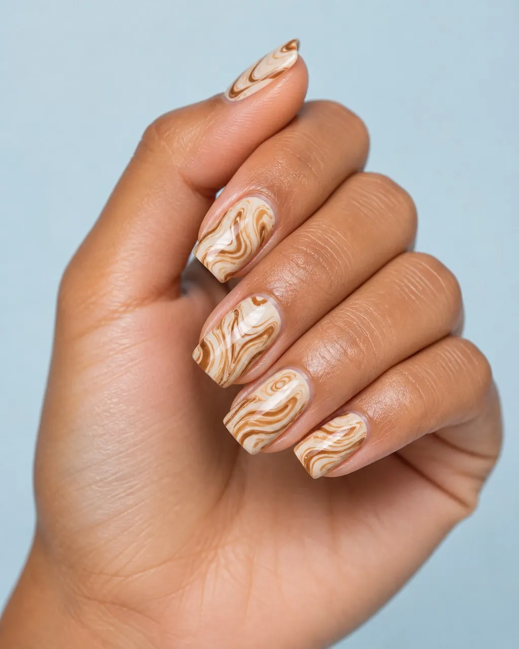 Toffee Swirl Marble — square fall nails with cream base, toffee marble swirl with dotting tool, glossy top coat, square shape