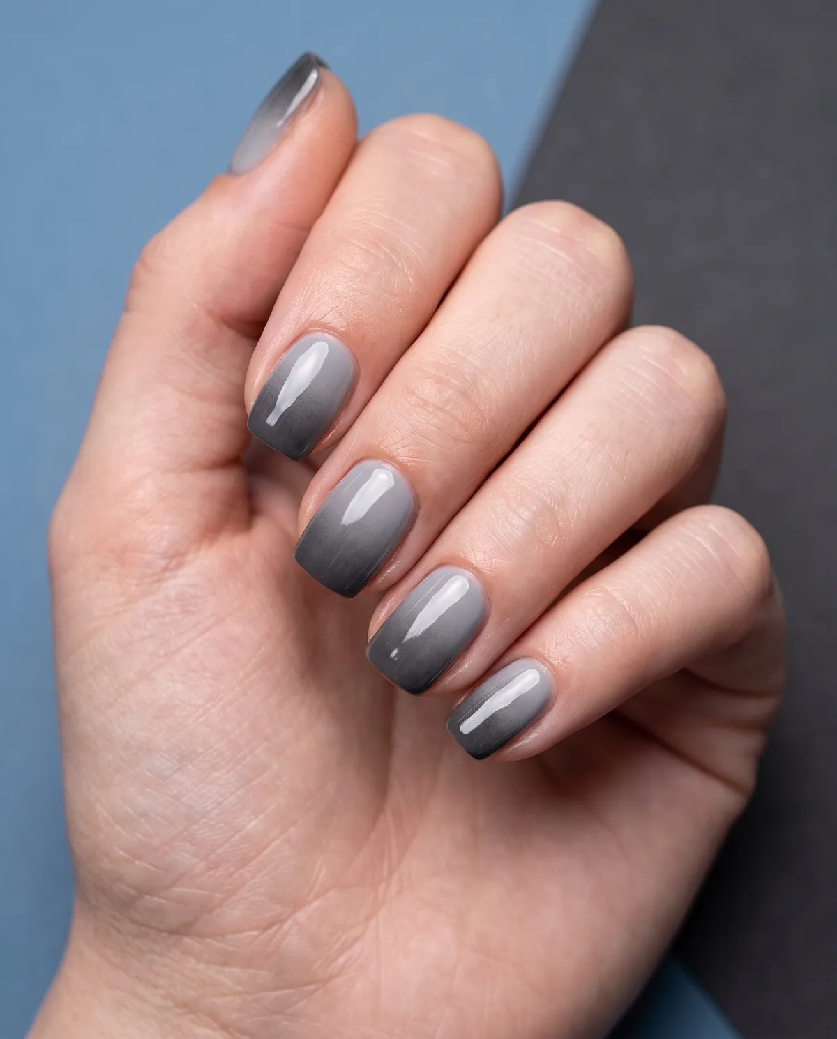 Ash Ember Ombre — square halloween nails with gradient a grey-to-charcoal gel ombre on short square nails with a soft blended edge and glossy…