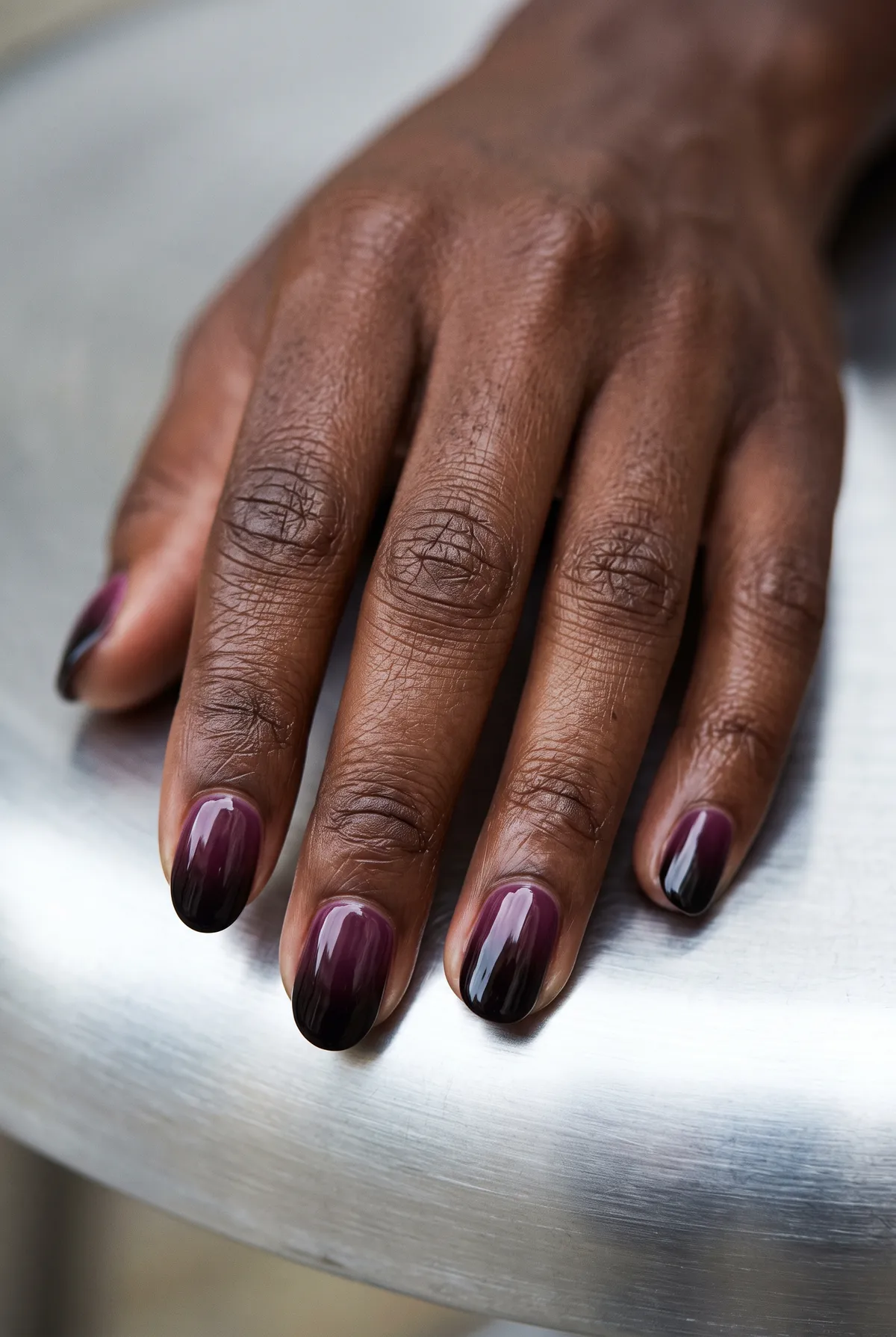 Plum Fog Ombre — round halloween nails with blend plum into black gel ombre on round nails with a soft cuticle-to-tip fade and glossy finish