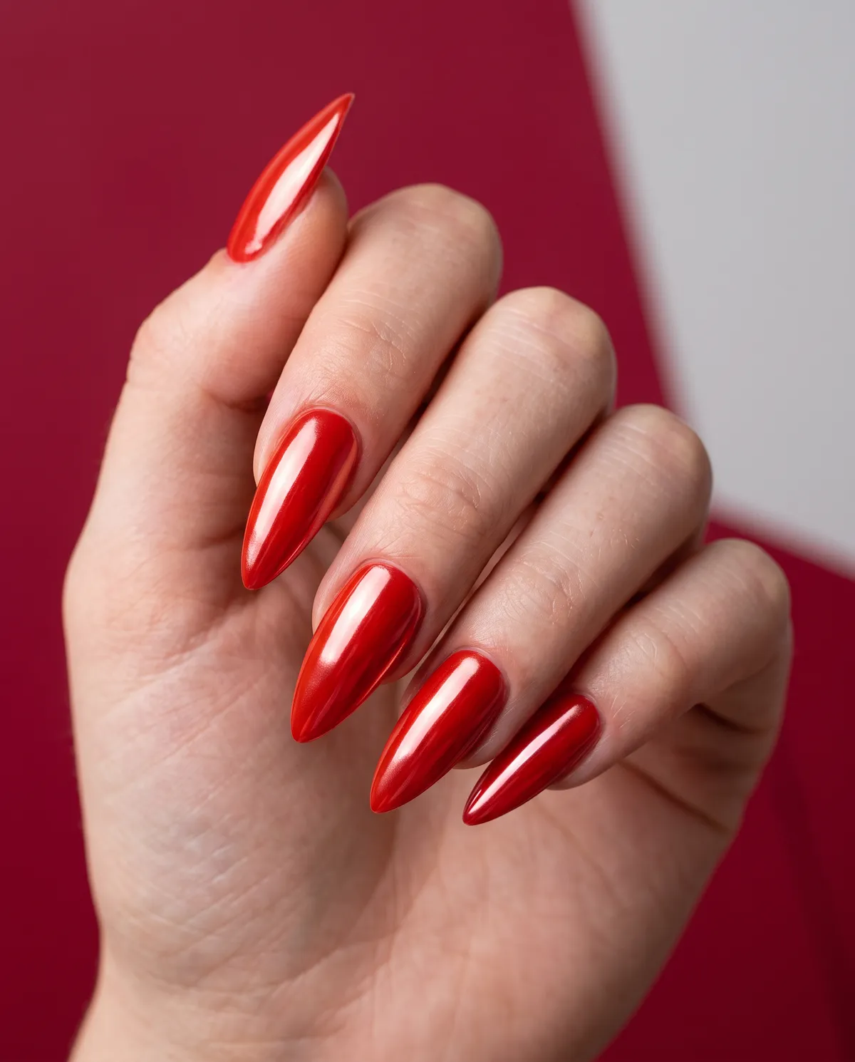 Mirror Flame — stiletto red nails with i want a bright red base with a mirror chrome powder finish on long stiletto nails