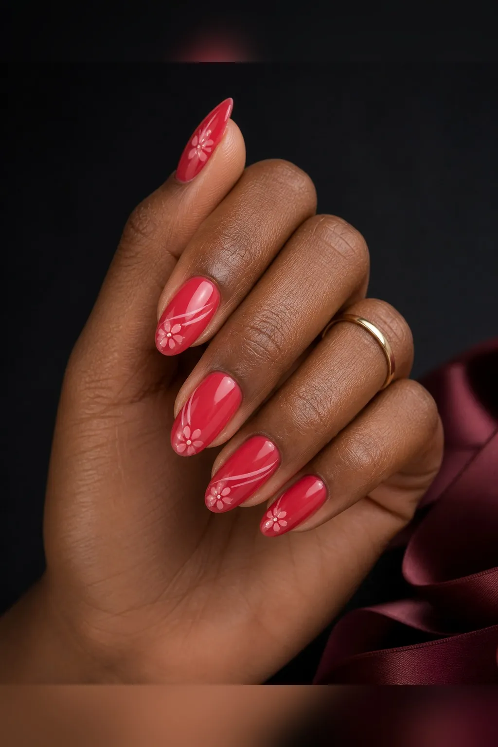 Strawberry Jelly — almond red nails with sheer strawberry-red jelly polish, three thin coats for depth, glossy top coat, medium almond