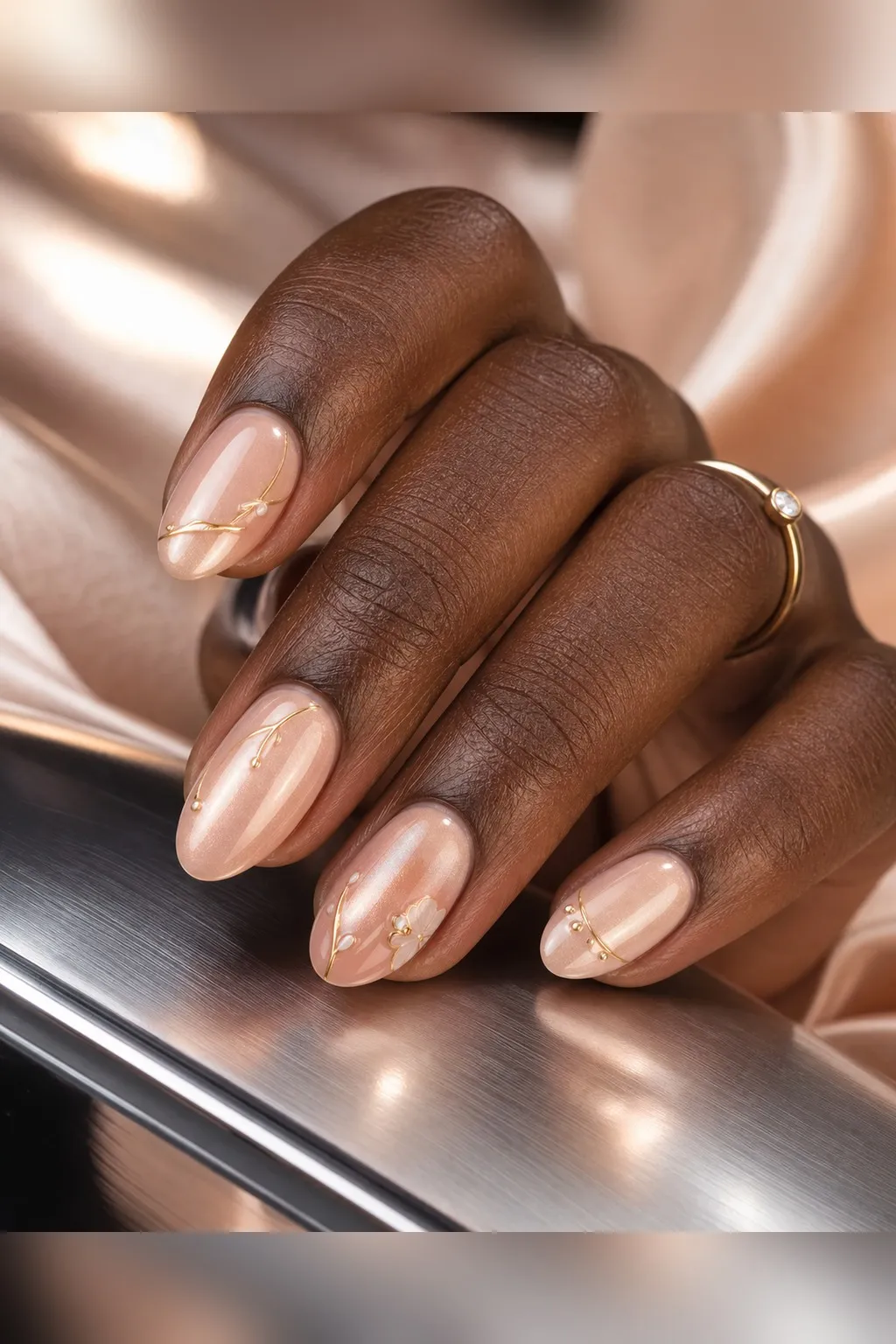Nude Chrome Short Almond — short almond nails with rosy nude base with a soft chrome powder buffed over for a polished-shell shine, glossy…