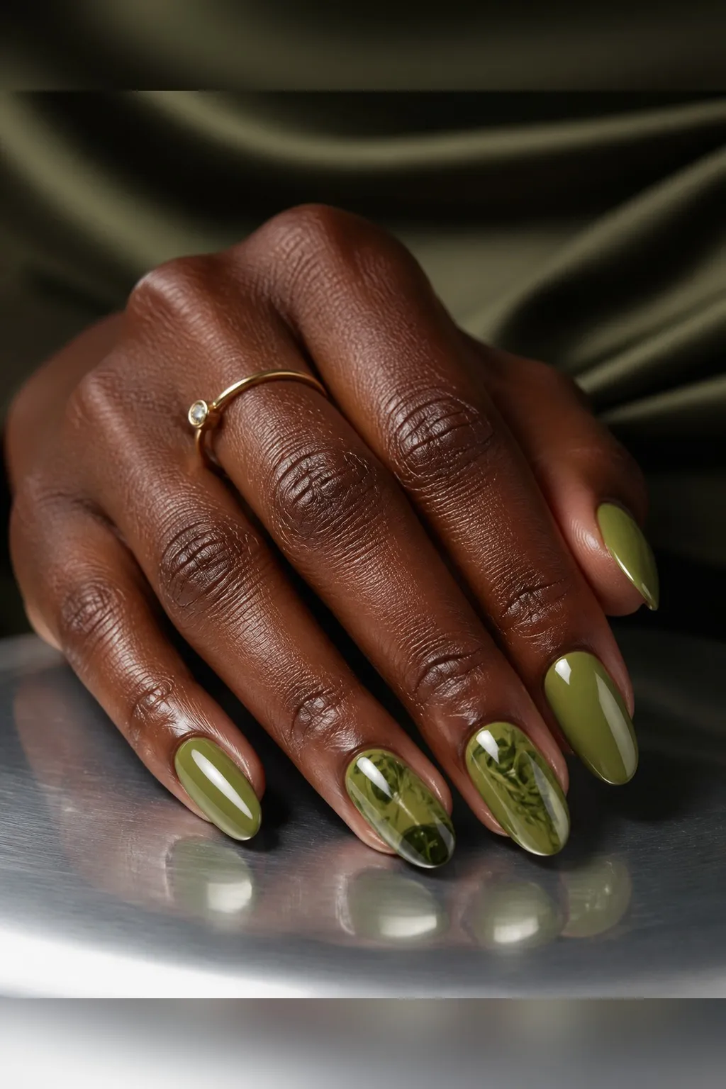 Olive Short Almond — short almond nails with olive green crème, two coats, glossy top coat, short almond