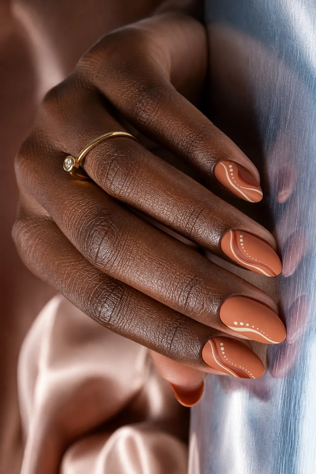 Terracotta Short Almond — short almond nails with warm terracotta crème, two coats, matte top coat, short almond