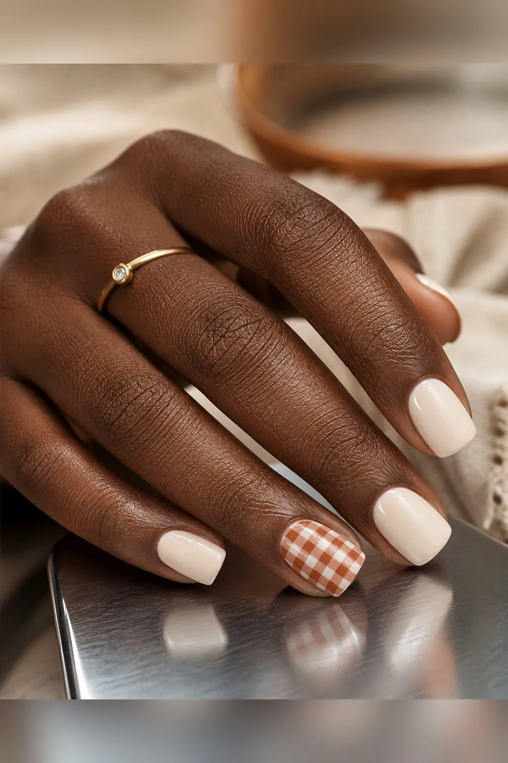Gingham Table Accent — square thanksgiving nails with sheer cream set with a small rust-and-white gingham check on the ring fingers only…