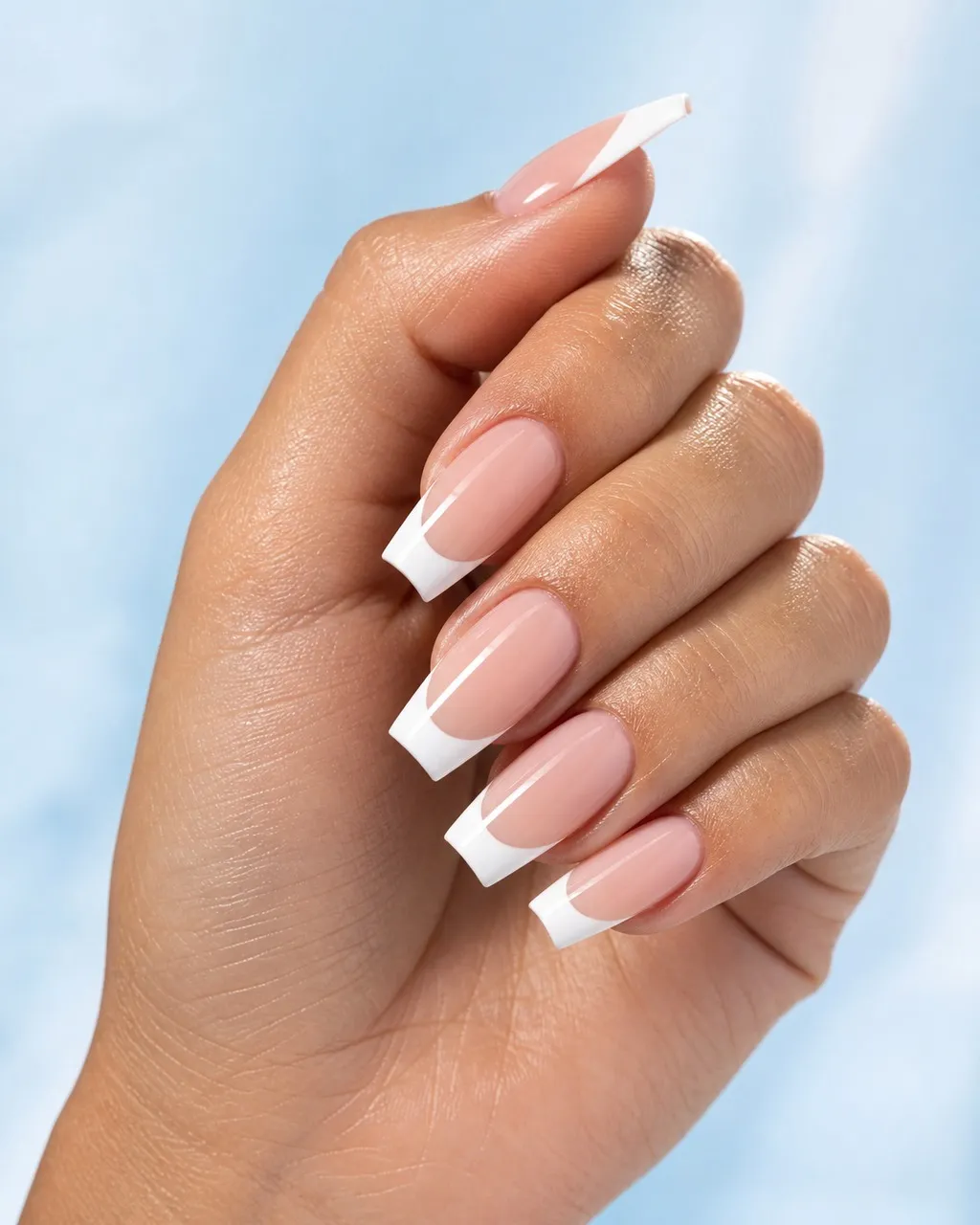Classic Depth Coffin French — coffin french nails with warm sheer pink base with a deep classic white french tip along a straight smile line…