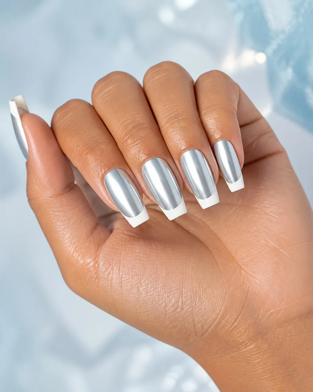 Chrome Base White French — coffin french nails with silver mirror chrome base with a crisp white french tip along a straight smile line…